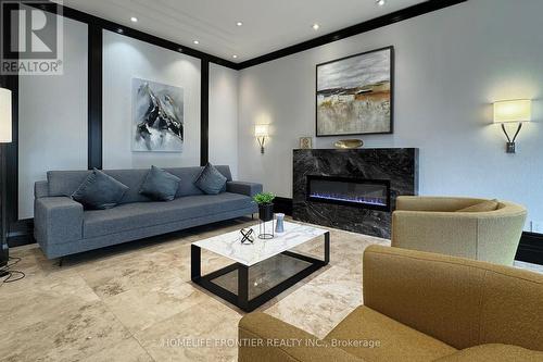 610 - 100 Promenade Circle, Vaughan, ON - Indoor Photo Showing Living Room With Fireplace