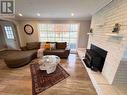 1015 Westmount Avenue, Innisfil, ON  - Indoor Photo Showing Living Room With Fireplace 