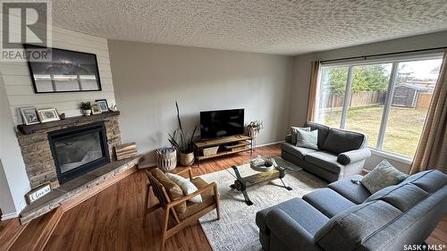 1706 98Th Street, Tisdale, SK - Indoor Photo Showing Living Room With Fireplace