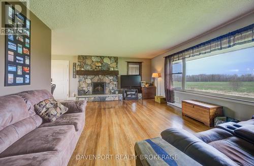 298 London Road S, Wellington North, ON - Indoor Photo Showing Living Room With Fireplace