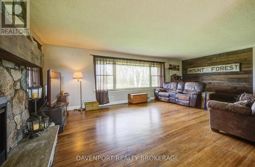 298 London Road S, Wellington North, ON - Indoor Photo Showing Living Room With Fireplace