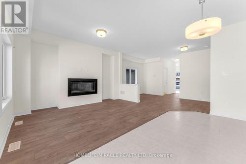 65 George Brier Drive, Brant, ON - Indoor Photo Showing Living Room With Fireplace