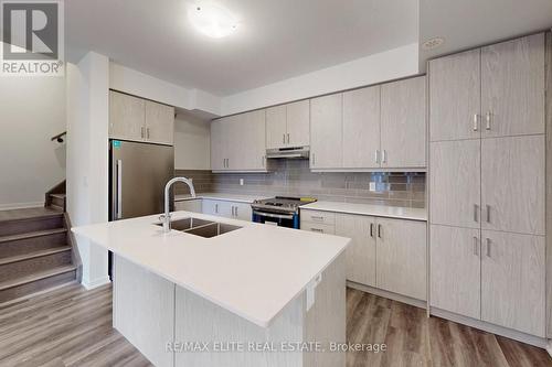 361 - 90 Honeycrisp Cres Way, Vaughan, ON - Indoor Photo Showing Kitchen With Double Sink With Upgraded Kitchen
