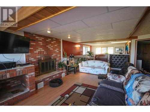 13059 Leer Subdivision, Dawson Creek, BC - Indoor Photo Showing Living Room With Fireplace