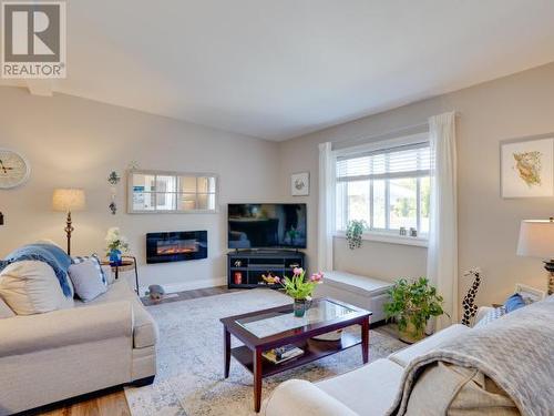 115-8430 Springbrook Road, Powell River, BC - Indoor Photo Showing Living Room With Fireplace