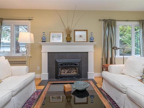 2345 Queenswood Dr, Saanich, BC - Indoor Photo Showing Living Room With Fireplace