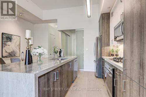 307 - 14 Dewhurst Boulevard, Toronto, ON - Indoor Photo Showing Kitchen With Upgraded Kitchen