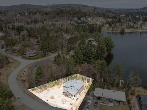 Photo aÃ©rienne - 897 Ch. Du Lac, Saint-Sauveur, QC - Outdoor With Body Of Water With View