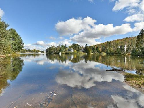 897 Ch. Du Lac, Saint-Sauveur, QC - Outdoor With Body Of Water With View