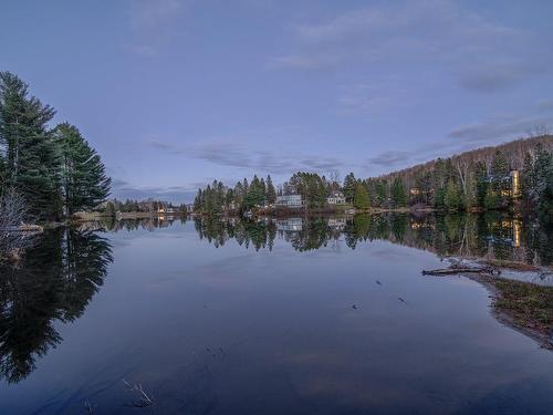 Vue sur l'eau - 897 Ch. Du Lac, Saint-Sauveur, QC - Outdoor With Body Of Water With View