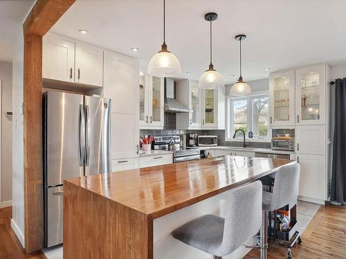 Cuisine - 28 Rue Ozias-Leduc, Blainville, QC - Indoor Photo Showing Kitchen With Upgraded Kitchen