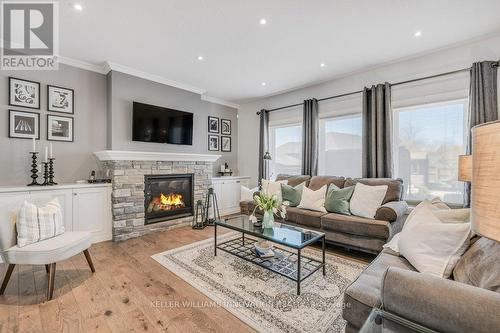 565 Rogers Road, North Perth, ON - Indoor Photo Showing Living Room With Fireplace