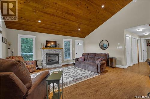 31 Candy Apple Lane, Cambridge-Narrows, NB - Indoor Photo Showing Living Room With Fireplace