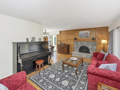 5557 Old West Saanich Rd, Saanich, BC - Indoor Photo Showing Living Room With Fireplace