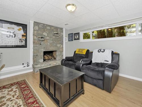 5557 Old West Saanich Rd, Saanich, BC - Indoor Photo Showing Living Room With Fireplace
