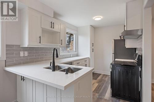 13 Hartsfield Drive, Clarington, ON - Indoor Photo Showing Kitchen With Double Sink