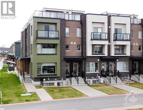 840 Mikinak Road, Ottawa, ON - Outdoor With Balcony With Facade