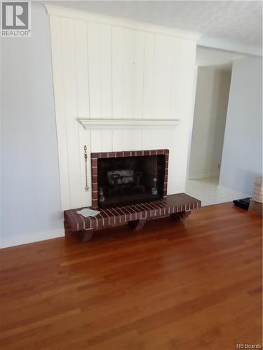 156 St. James Street, Woodstock, NB - Indoor Photo Showing Living Room With Fireplace
