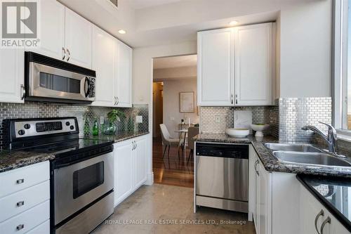 2110 - 5229 Dundas Street W, Toronto, ON - Indoor Photo Showing Kitchen With Double Sink With Upgraded Kitchen
