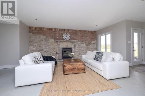 293138 8Th Line, Amaranth, ON - Indoor Photo Showing Living Room With Fireplace