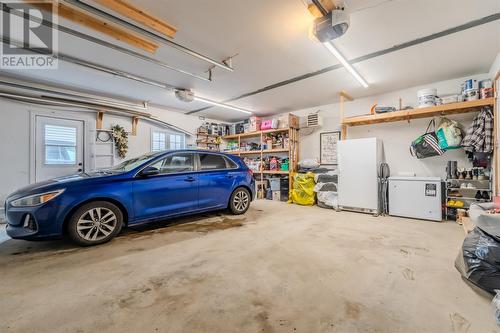 23 School Road, St. Philips, NL - Indoor Photo Showing Garage