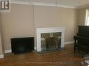 31 Kirkland Boulevard, Toronto, ON  - Indoor Photo Showing Living Room With Fireplace 