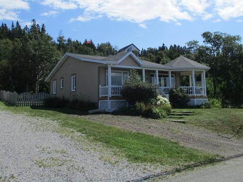 Aerial photo - 33 Ch. De La Grève O., Saint-Denis-De La Bouteillerie, QC - Outdoor With Deck Patio Veranda With Facade