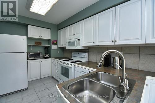 20 - 10 Huntingwood Avenue, Hamilton, ON - Indoor Photo Showing Kitchen With Double Sink