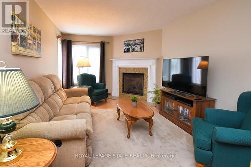 20 - 10 Huntingwood Avenue, Hamilton, ON - Indoor Photo Showing Living Room With Fireplace