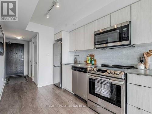 506 - 1401 O'Connor Drive, Toronto, ON - Indoor Photo Showing Kitchen With Stainless Steel Kitchen With Upgraded Kitchen