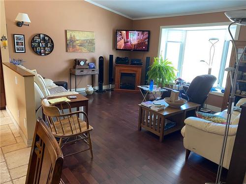 800 3Rd Avenue W, Oak Lake, MB - Indoor With Fireplace