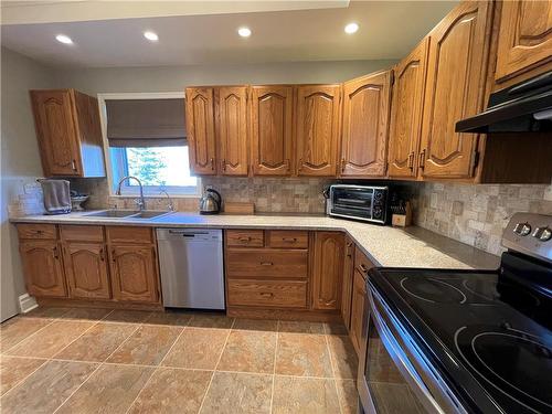 325 2Nd Avenue, Mccreary, MB - Indoor Photo Showing Kitchen With Double Sink