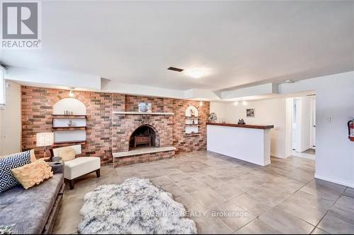 451 Lakeview Road, Fort Erie, ON - Indoor Photo Showing Living Room With Fireplace