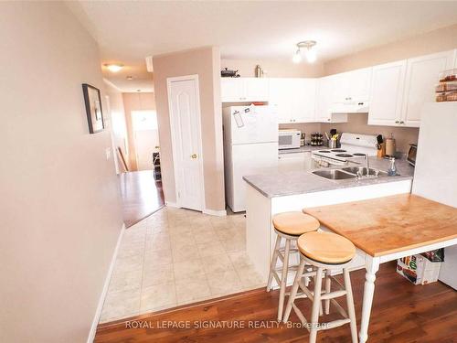 Upper-329 Spillsbury Dr, Otonabee-South Monaghan, ON - Indoor Photo Showing Kitchen With Double Sink