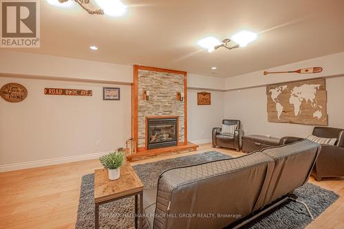 4164 Forest Wood Drive, Severn, ON - Indoor With Fireplace
