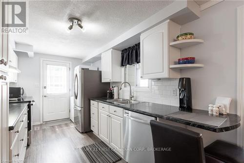 301 Glen Abbey Court, South Huron, ON - Indoor Photo Showing Kitchen With Double Sink