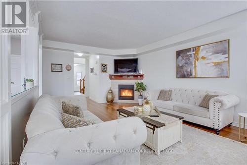 3380 Jinnies Way, London, ON - Indoor Photo Showing Living Room With Fireplace