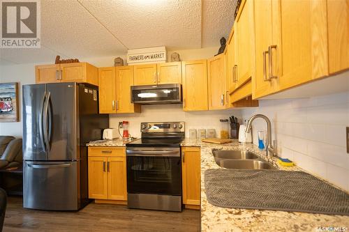202 2781 Woodbridge Drive, Prince Albert, SK - Indoor Photo Showing Kitchen With Stainless Steel Kitchen With Double Sink