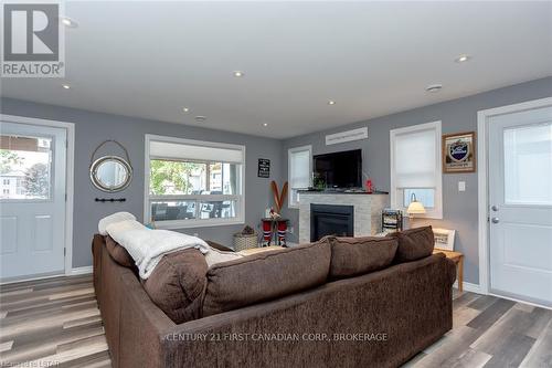 387 Stanley Park, Central Elgin, ON - Indoor Photo Showing Living Room With Fireplace