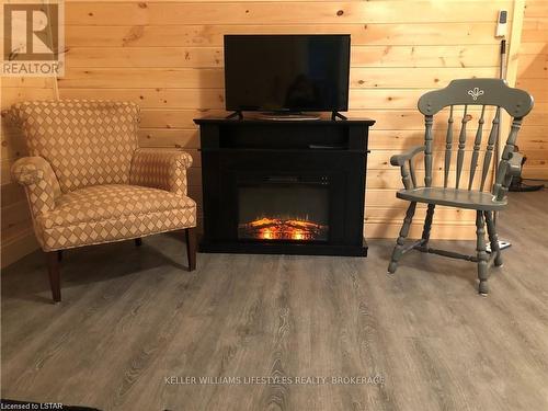 5 Victoria Place, Bluewater (Bayfield), ON - Indoor Photo Showing Living Room With Fireplace