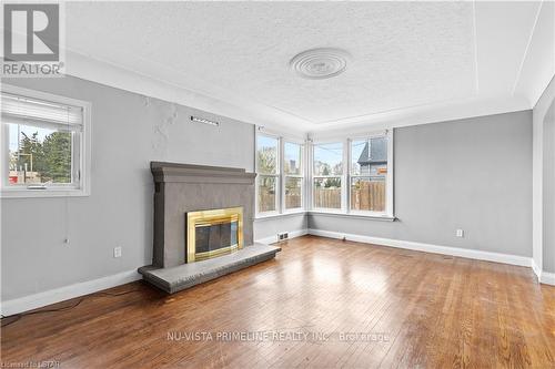 122 Highbury Ave N, London, ON - Indoor Photo Showing Living Room With Fireplace