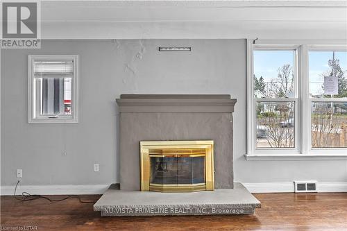 122 Highbury Ave N, London, ON - Indoor Photo Showing Living Room With Fireplace