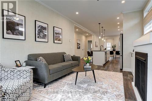 66 Fairview Crescent, North Perth, ON - Indoor Photo Showing Living Room With Fireplace