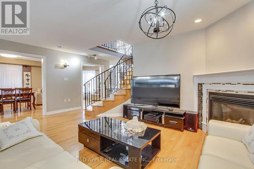 64 Metcalfe Drive, Bradford West Gwillimbury, ON - Indoor Photo Showing Living Room With Fireplace
