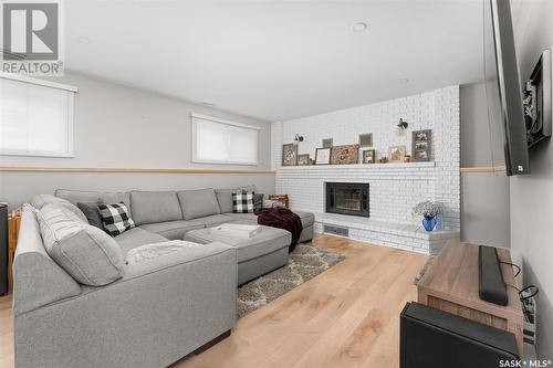 153 Bluesage Drive, Moose Jaw, SK - Indoor Photo Showing Living Room With Fireplace