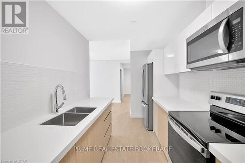 202 - 3290 Stella Crescent, Windsor, ON - Indoor Photo Showing Kitchen With Double Sink