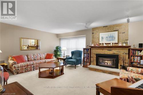 92 Meridene Crescent, London, ON - Indoor Photo Showing Living Room With Fireplace