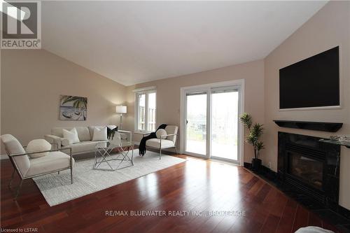 24 - 90 Ontario Street S, Lambton Shores, ON - Indoor Photo Showing Living Room With Fireplace