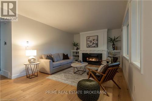 7007 Blue Coast Heights, Plympton-Wyoming, ON - Indoor Photo Showing Living Room With Fireplace