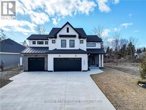7007 Blue Coast Heights, Plympton-Wyoming, ON - Outdoor With Facade